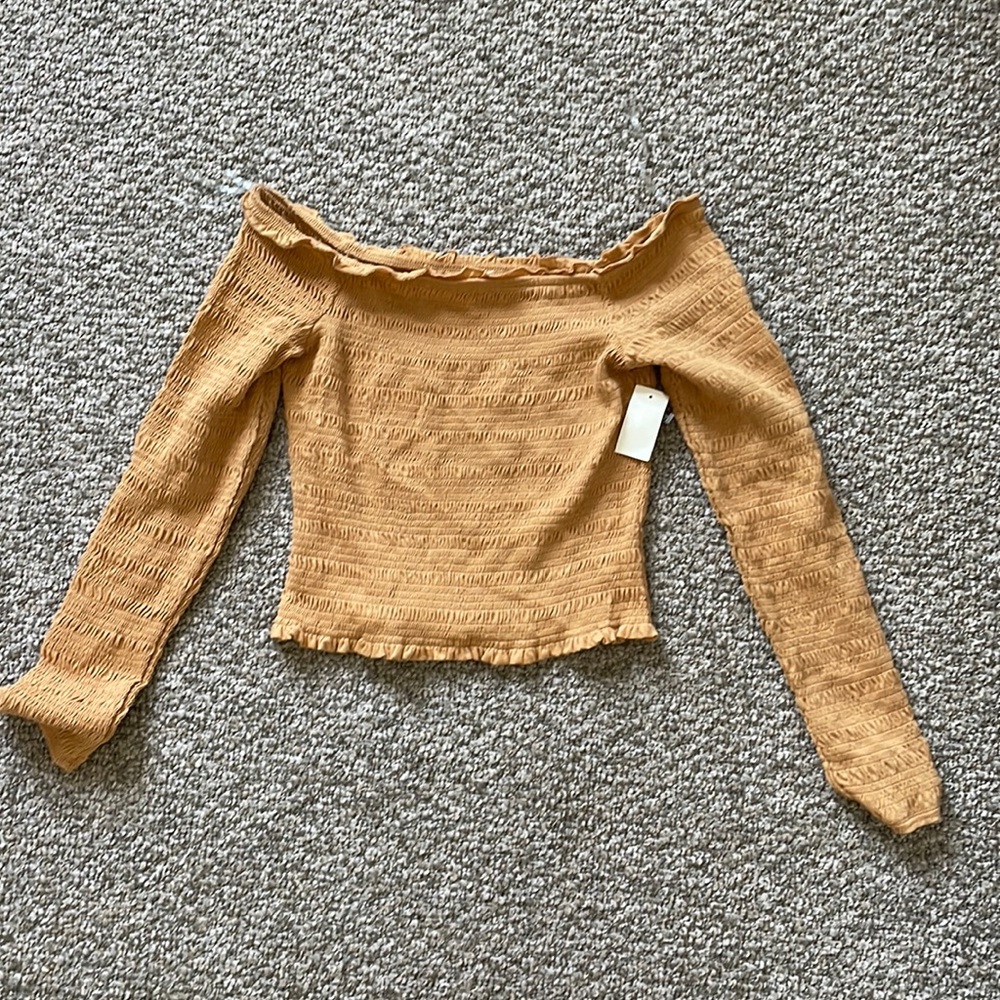 Off the shoulder, long sleeve! Never worn!